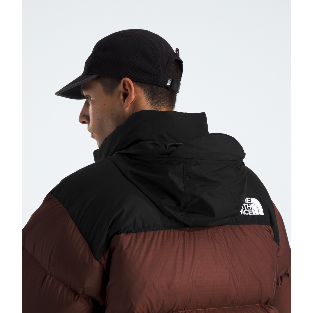 The North Face Men 996 Retro Nuptse Jacket in Ember Soil/TNF Black